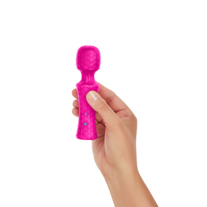 Pink FemmeFunn Ultra Wand Mini in hand