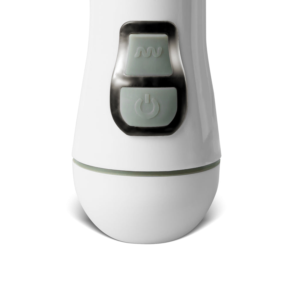 Close-up of a white vibrator with grey controls.