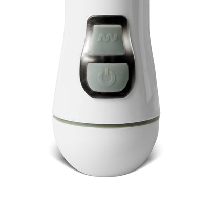 Close-up of a white vibrator with grey controls.