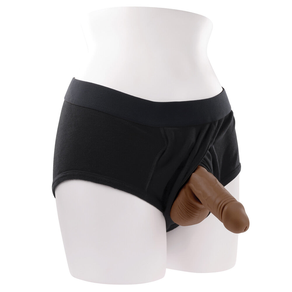 Empowering packer: Dark flesh stand to pee TPE prosthetic for gender expression, nestled in black undies. Confidence, your way.
