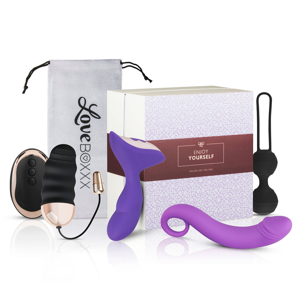 Loveboxxx Solo Woman's Box Gift Set with vibrator, wand, ring, box and storage bag, designed for your pleasure and self-discovery.
