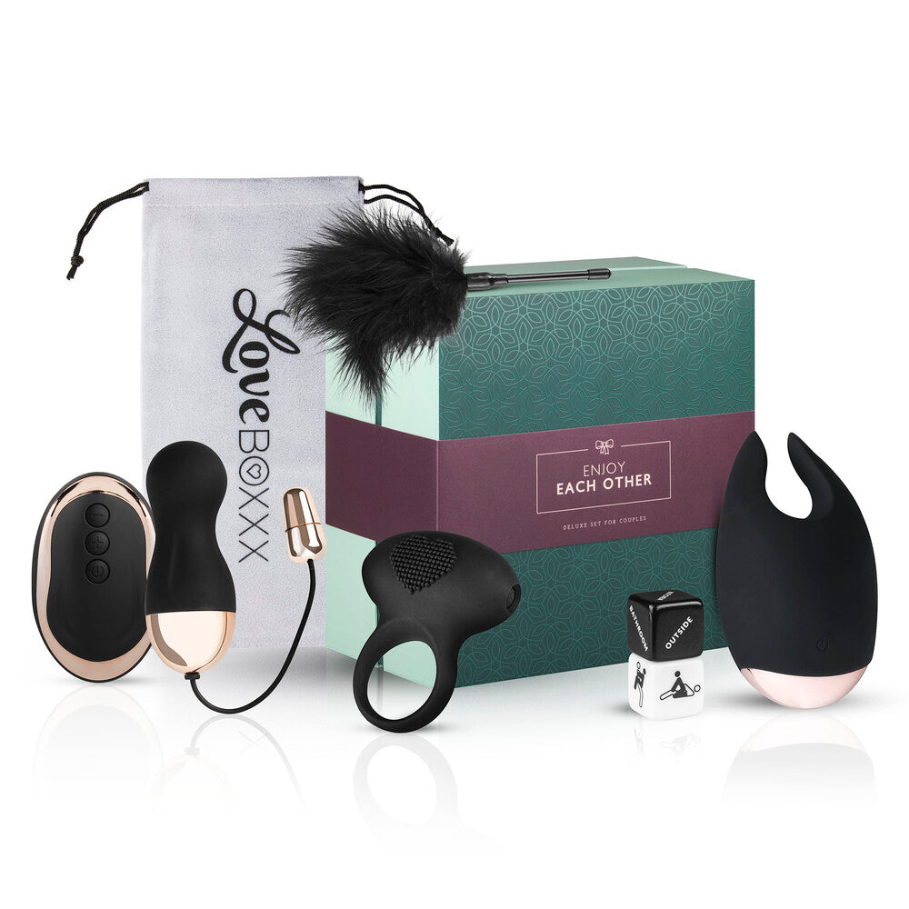 Loveboxxx couple's romantic gift set with massagers, dice and feather teaser.