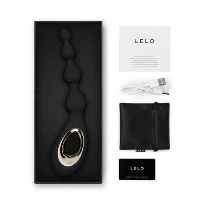 Lelo Soraya Wave anal beads vibrator in black with accessories and box, offering pleasure and exploration.
