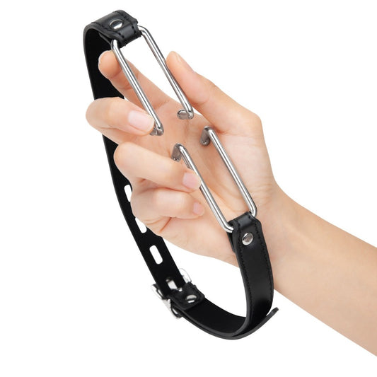 Leather gag held in hand