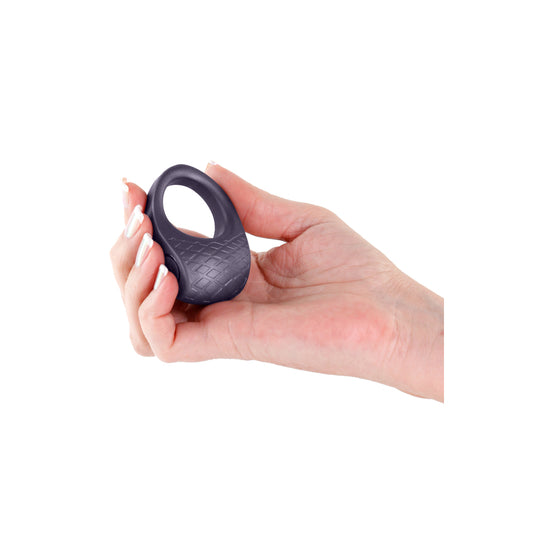 Rechargeable cockring in hand.