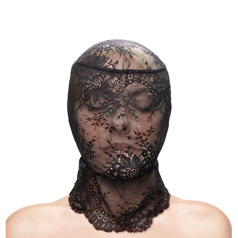 Black floral lace hood worn over a person's head, creating a sensual, mysterious look.
