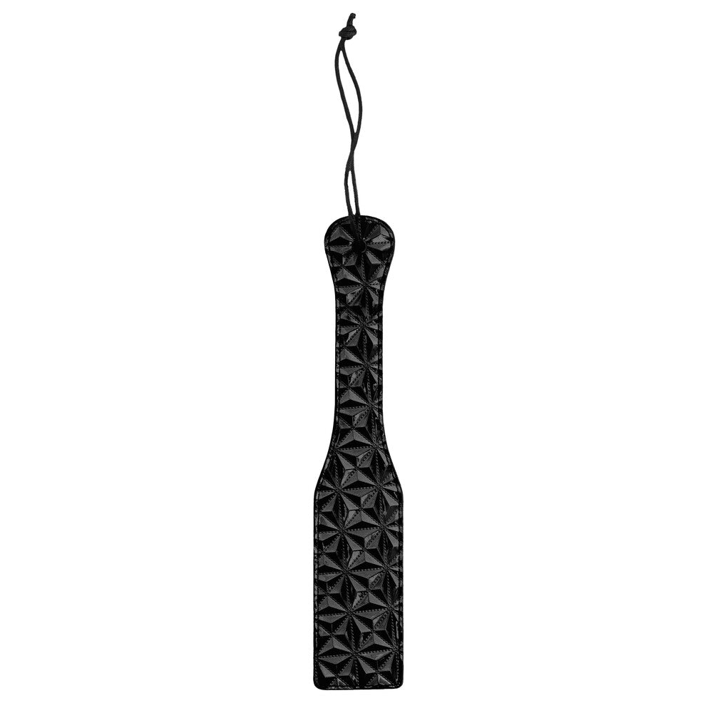 Textured black paddle from Shots Toys for pleasure, empowerment, and adventurous play.