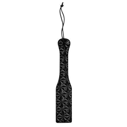 Textured black paddle from Shots Toys for pleasure, empowerment, and adventurous play.