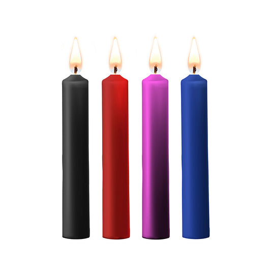 Wax play candles in black, red, pink, and blue.