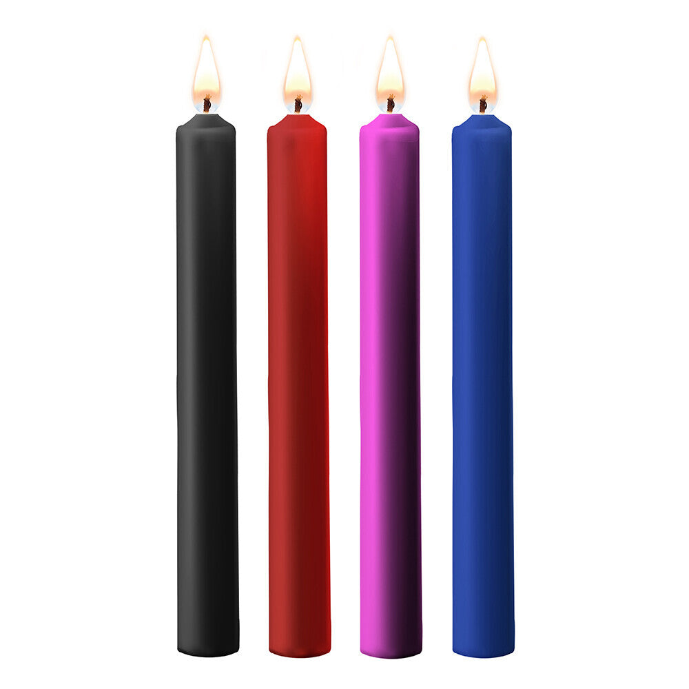 Teasing wax candles in black, red, purple and blue.