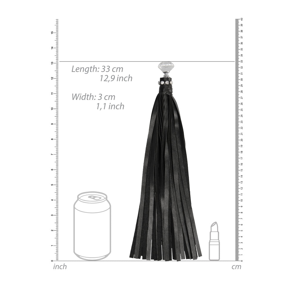 Diamond-studded flogger with measurements.