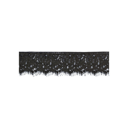Black lace eye mask detail.