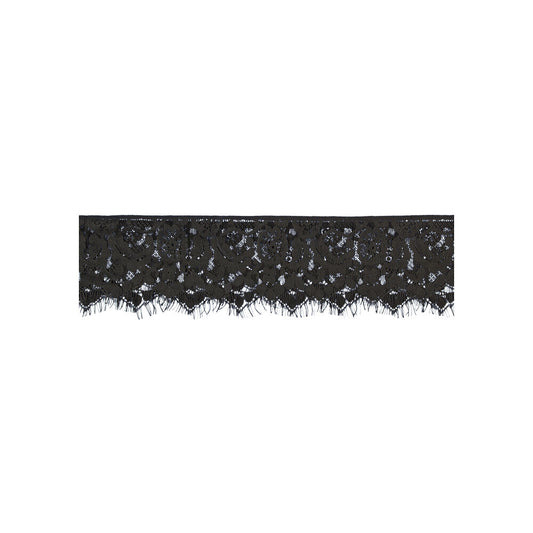Black lace eye mask detail.
