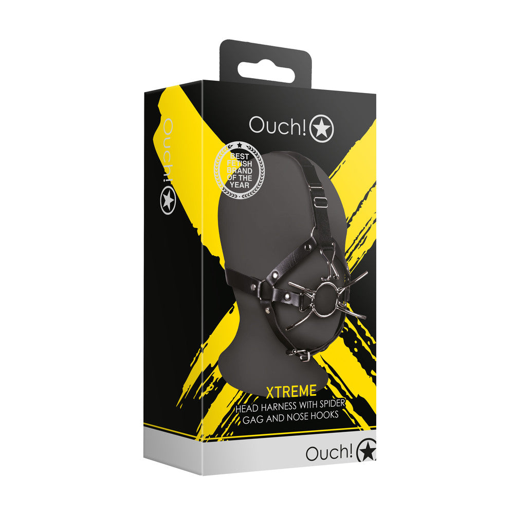 Ouch Xtreme Head Harness with Spider Gag and Nose Hooks in packaging.