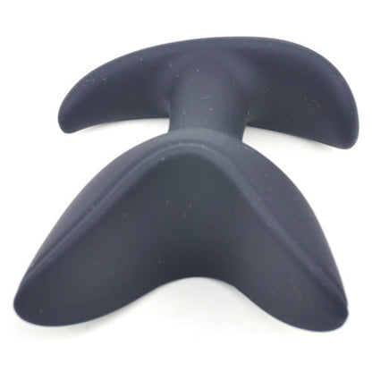 Sinfully smooth, this sleek black silicone delight offers the promise of cheeky thrills and boundless pleasure. 

