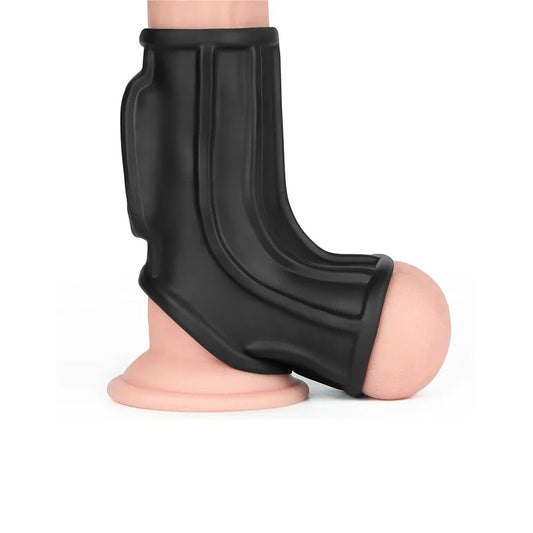 Close-up of a black ribbed penis sleeve enhancer.