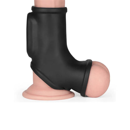 Lovetoy vibrating penis and scrotum sleeve in black.