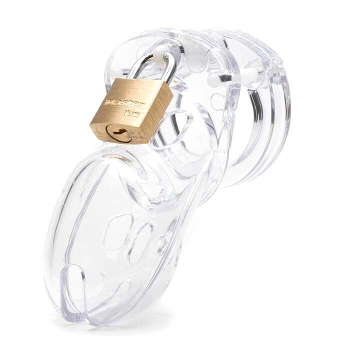 Clear plastic chastity, a tease of control and gilded restraint, a most curious of desires.
