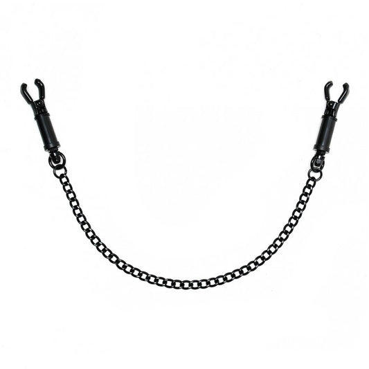 Intriguing black metal clamps, a tantalising touch suspended by a seductive chain.
