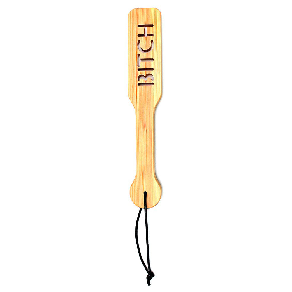 Wooden Bitch Paddle for playful pleasure.