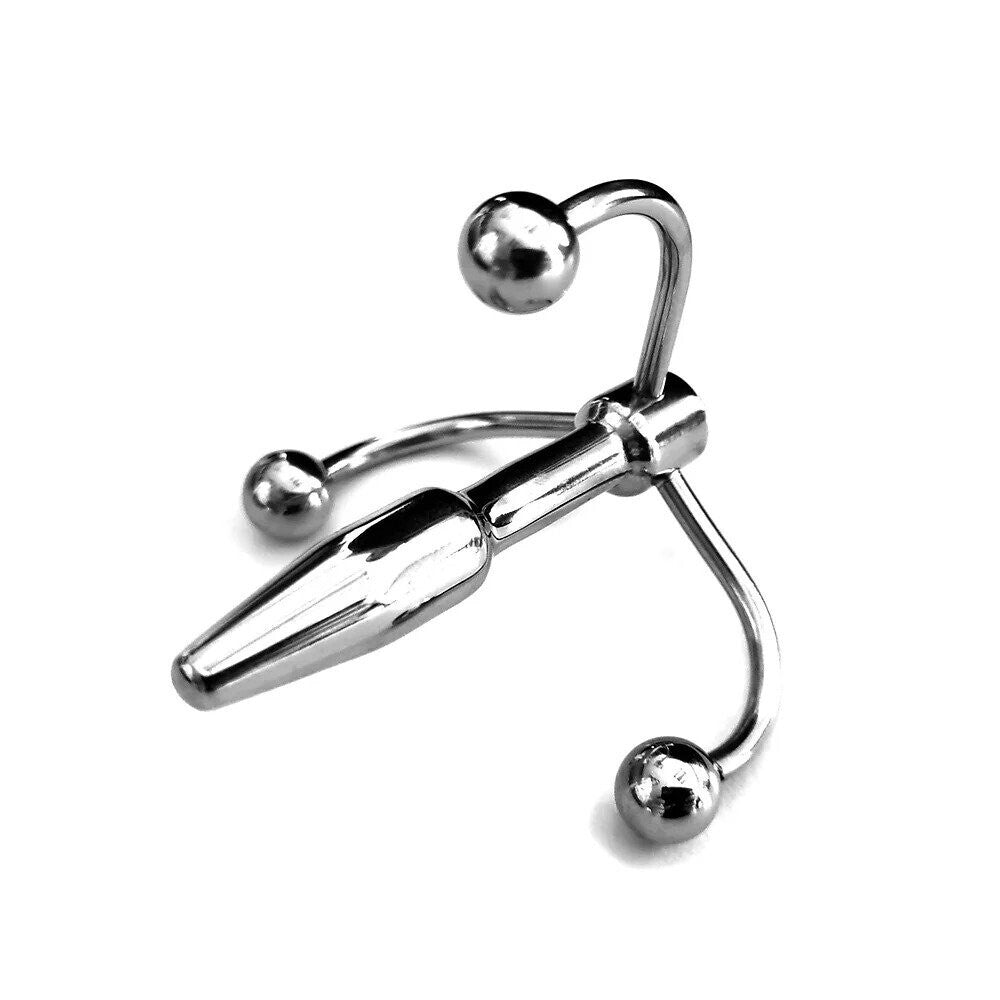 Chrome Rouge Garments crown penis plug.