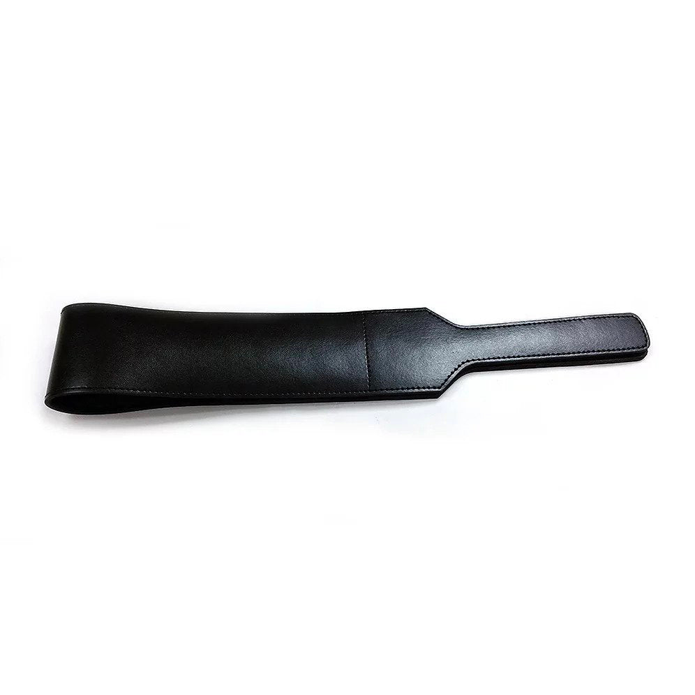 Black folded paddle from Rouge Garments. Explore your playful side!
