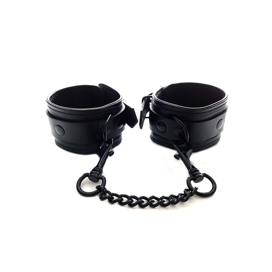 Rouge Garments black faux leather wrist cuffs with chain.
