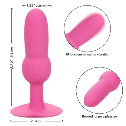 Pink vibrating beaded probe with measurements.