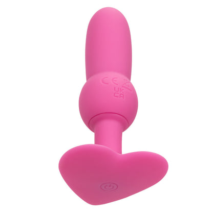 Pink vibrating beaded probe toy with heart-shaped base