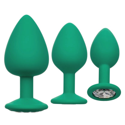 Emerald seduction: three jewelled butt plugs for a touch of cheeky pleasure.