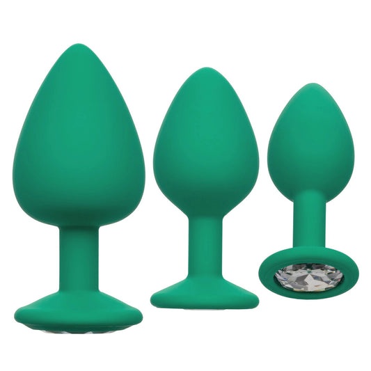 Emerald seduction: three jewelled butt plugs for a touch of cheeky pleasure.