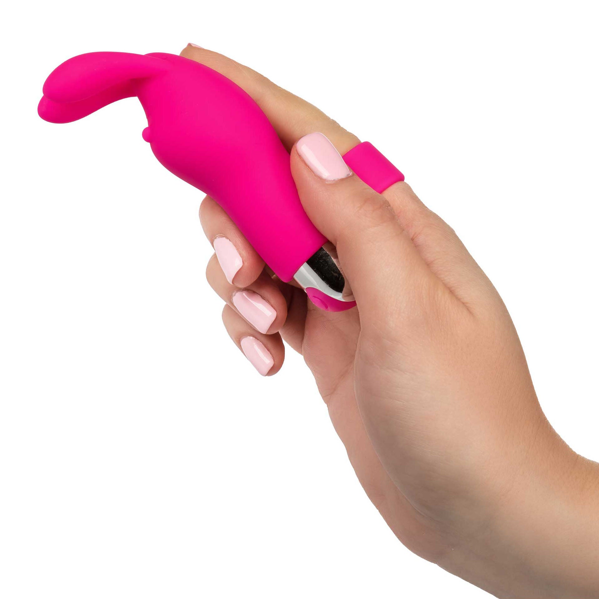 Pink bunny finger vibrator held by a manicured hand.