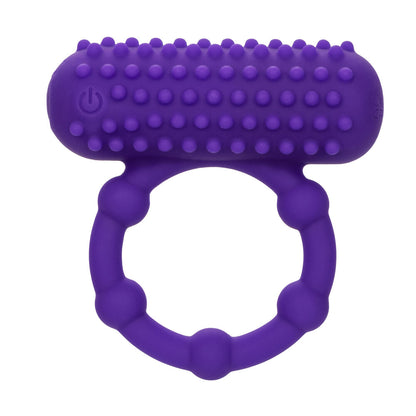 A cheeky purple cock ring, studded for added delight. A little tickle and a lot of fun, wouldn't you say?
