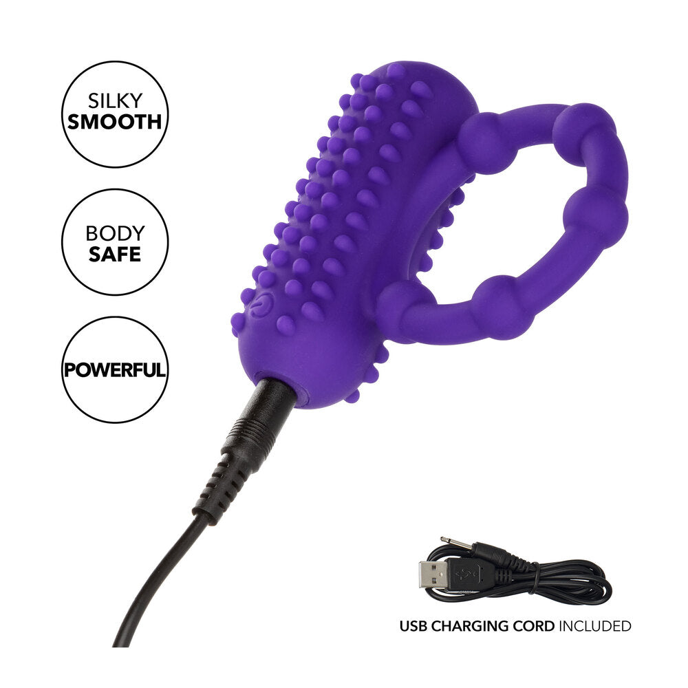 Intense pleasure awaits with this beaded purple cock ring. Rechargeable fun for thrilling nights!
