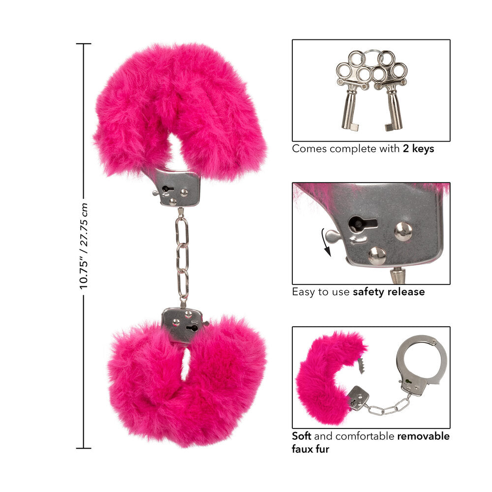Fluffy pink furry cuffs with keys and safety release information.
