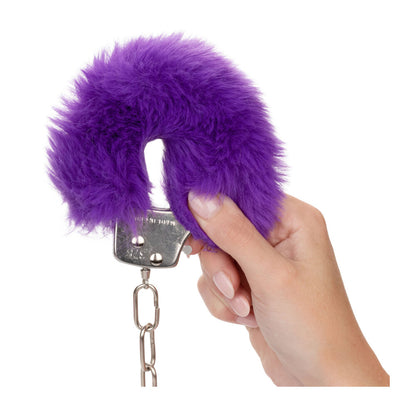 Fluffy purple furry handcuffs for playful adults.
