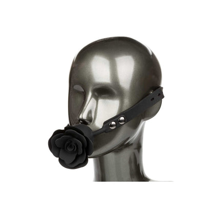 Black rose gag on mannequin's head.

