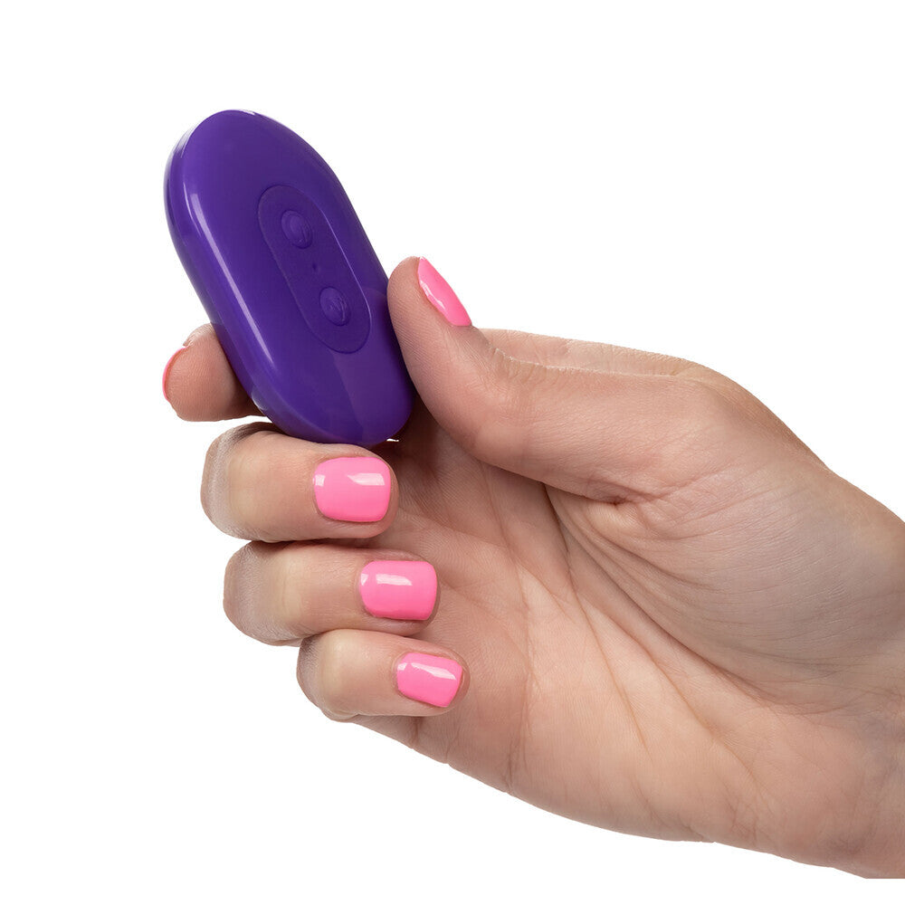 Purple remote in hand