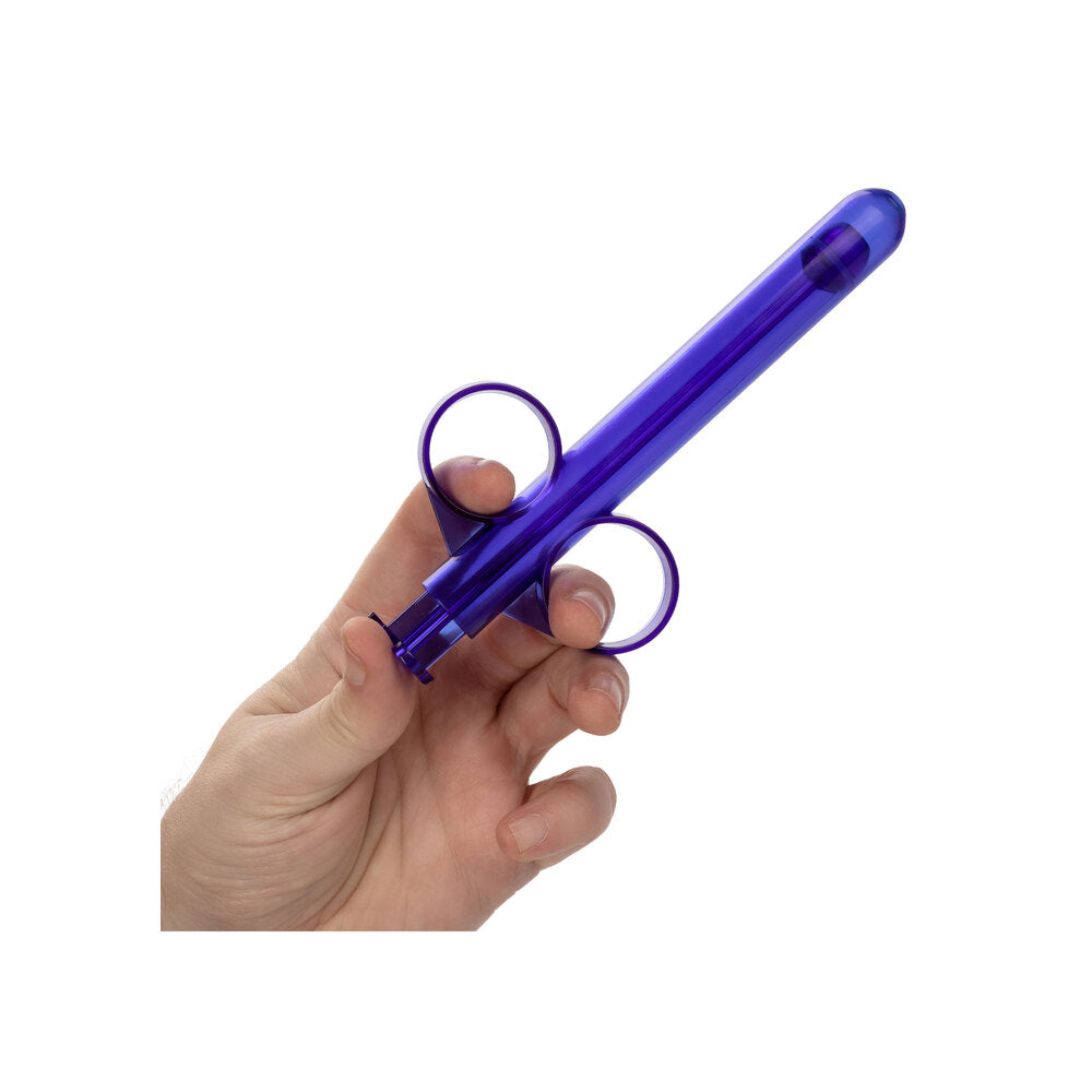 Here's a description fitting your requirements:

Purple applicator, held delicately, promises seamless indulgence. Silky smooth intimacy awaits.