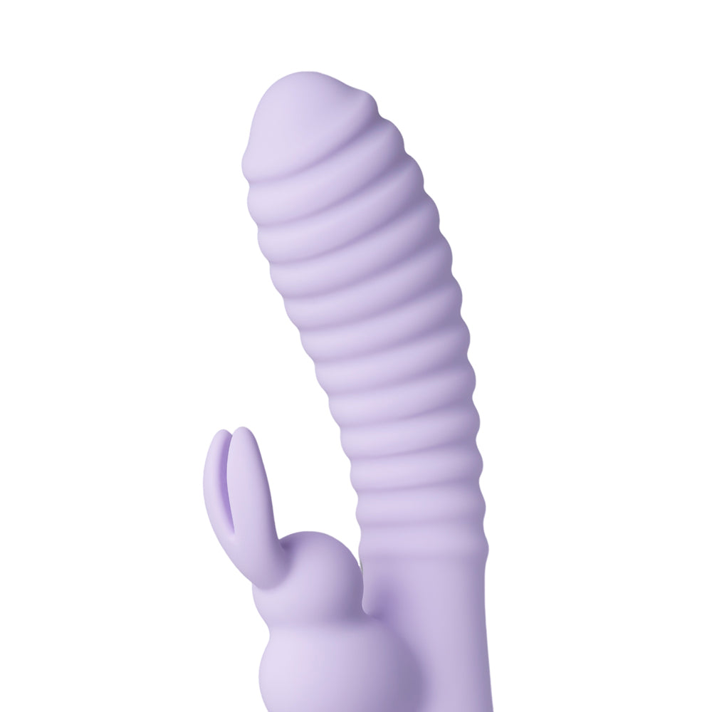 Purple rabbit vibrator with ribbed texture for exciting exploration.