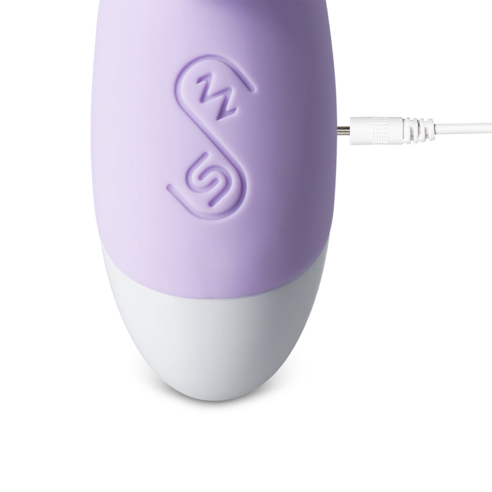 Purple and white rechargeable vibrator.