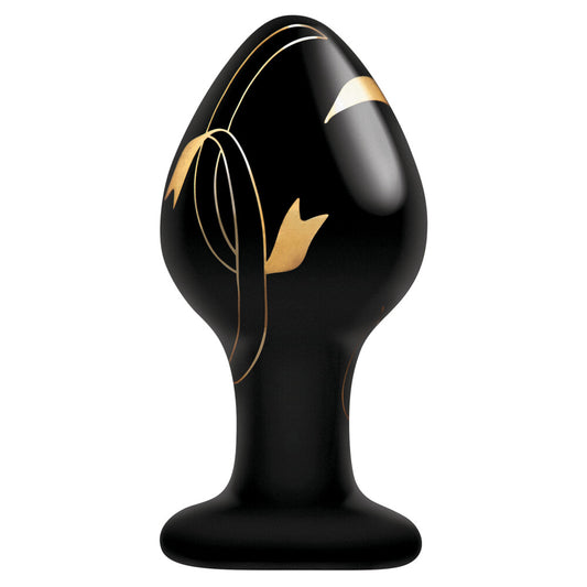 Black glass butt plug with gold ribbon detail.
