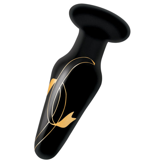 Black glass butt plug with gold accents