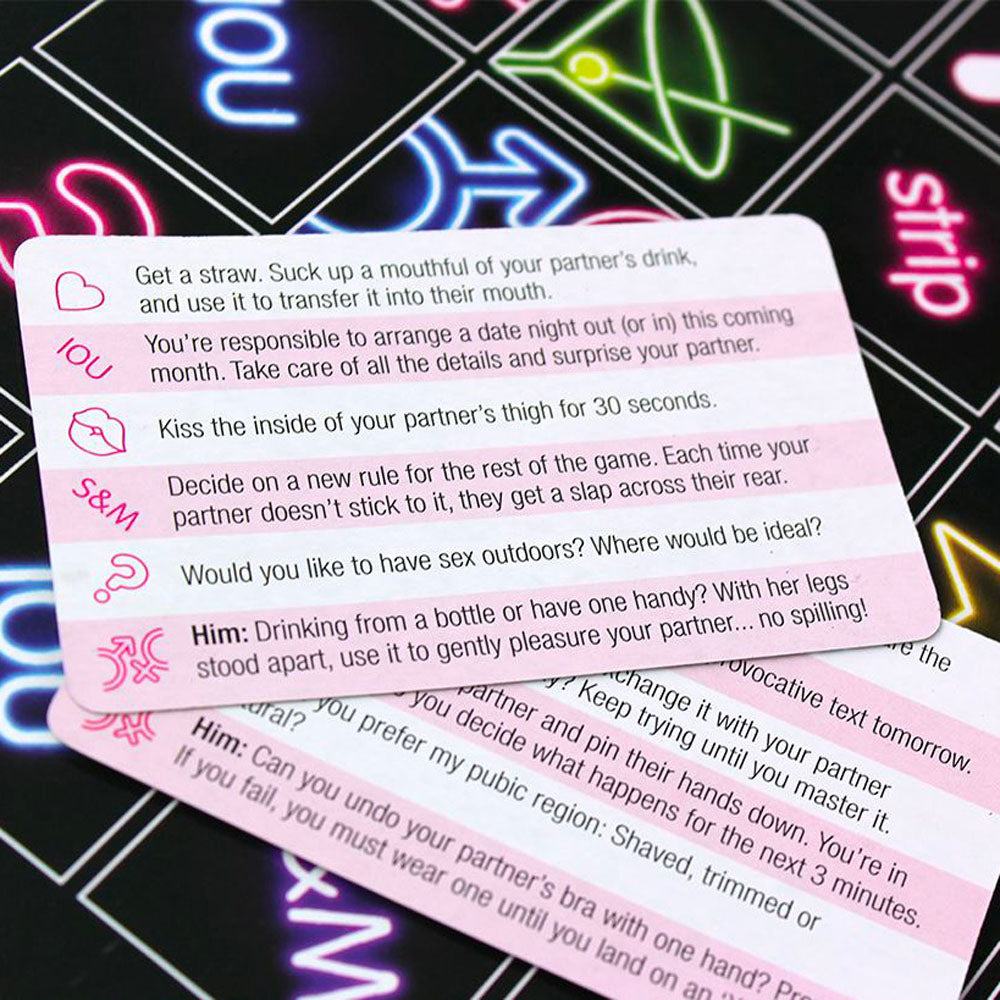 Saucy board game.

Cards from the "Sex Marks The Spot" game, filled with flirty dares for couples.