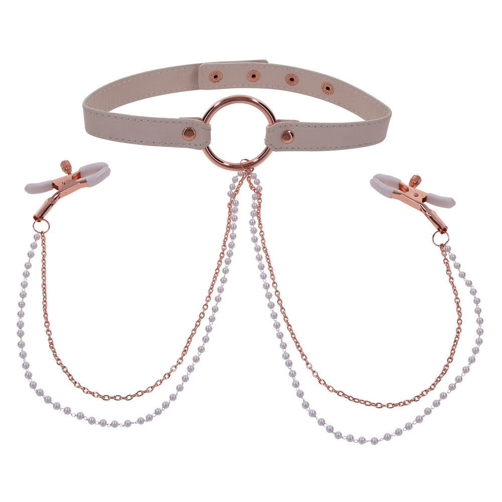 Beige collar with nipple clamps.