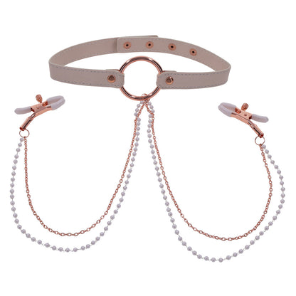 Beige collar with nipple clamps.