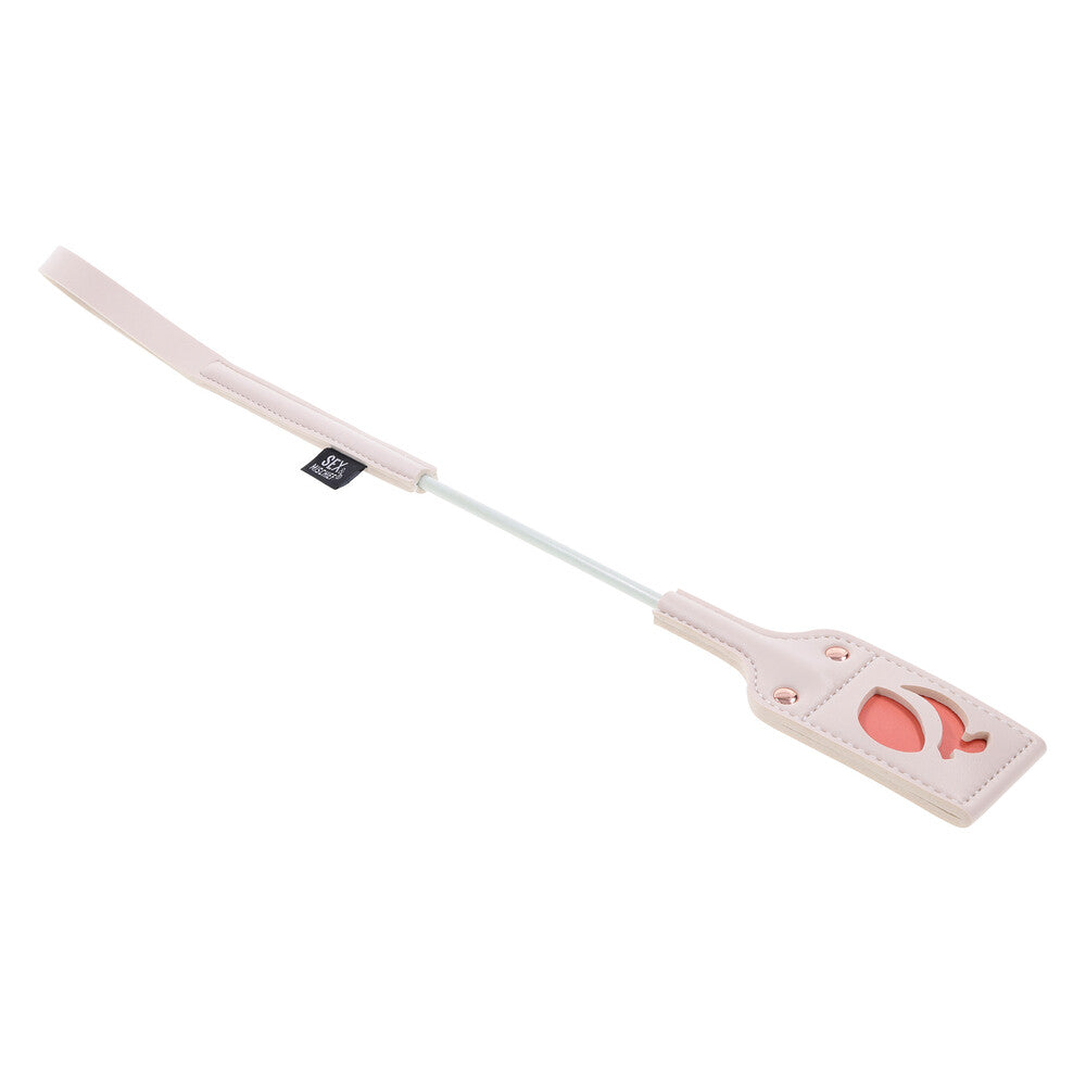 Sportsheets spanker with peach-shaped cutouts.
