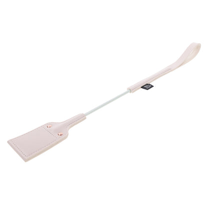 Light pink faux leather paddle.
