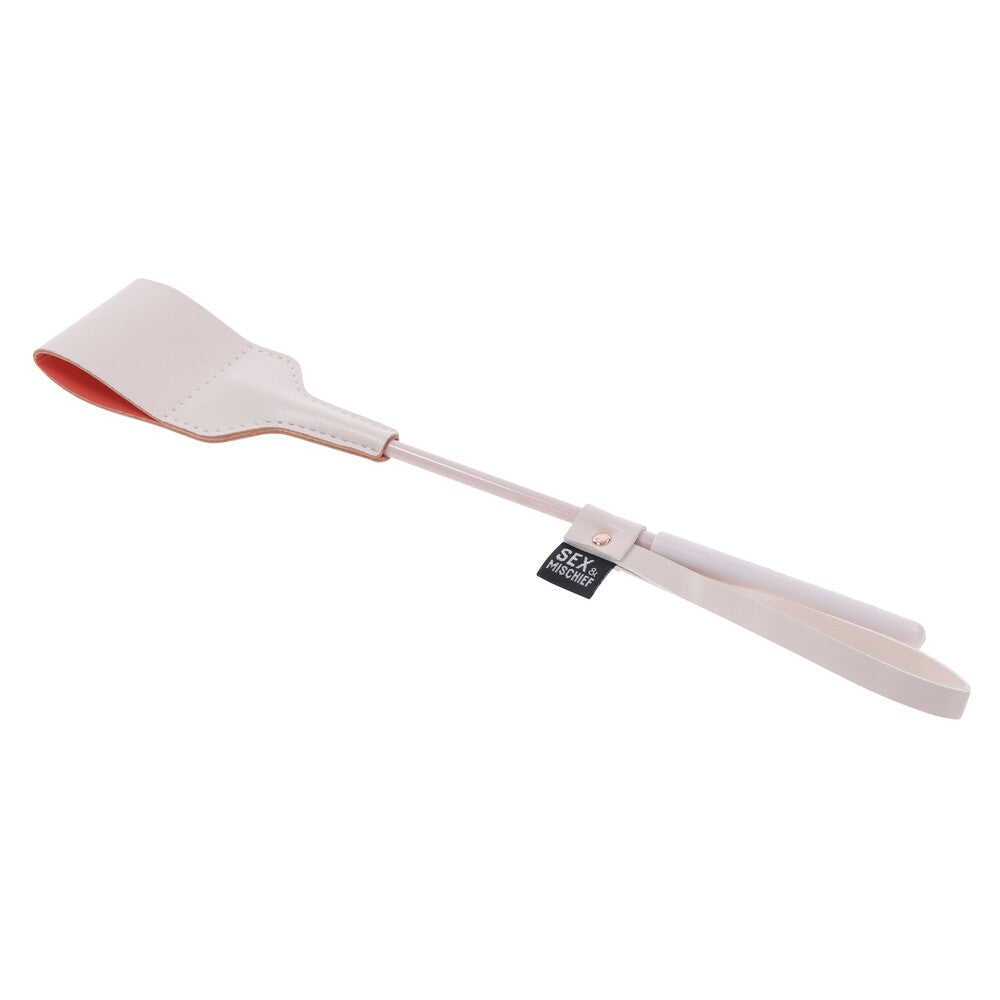 Sportsheets Sex & Mischief riding crop in pale pink.
