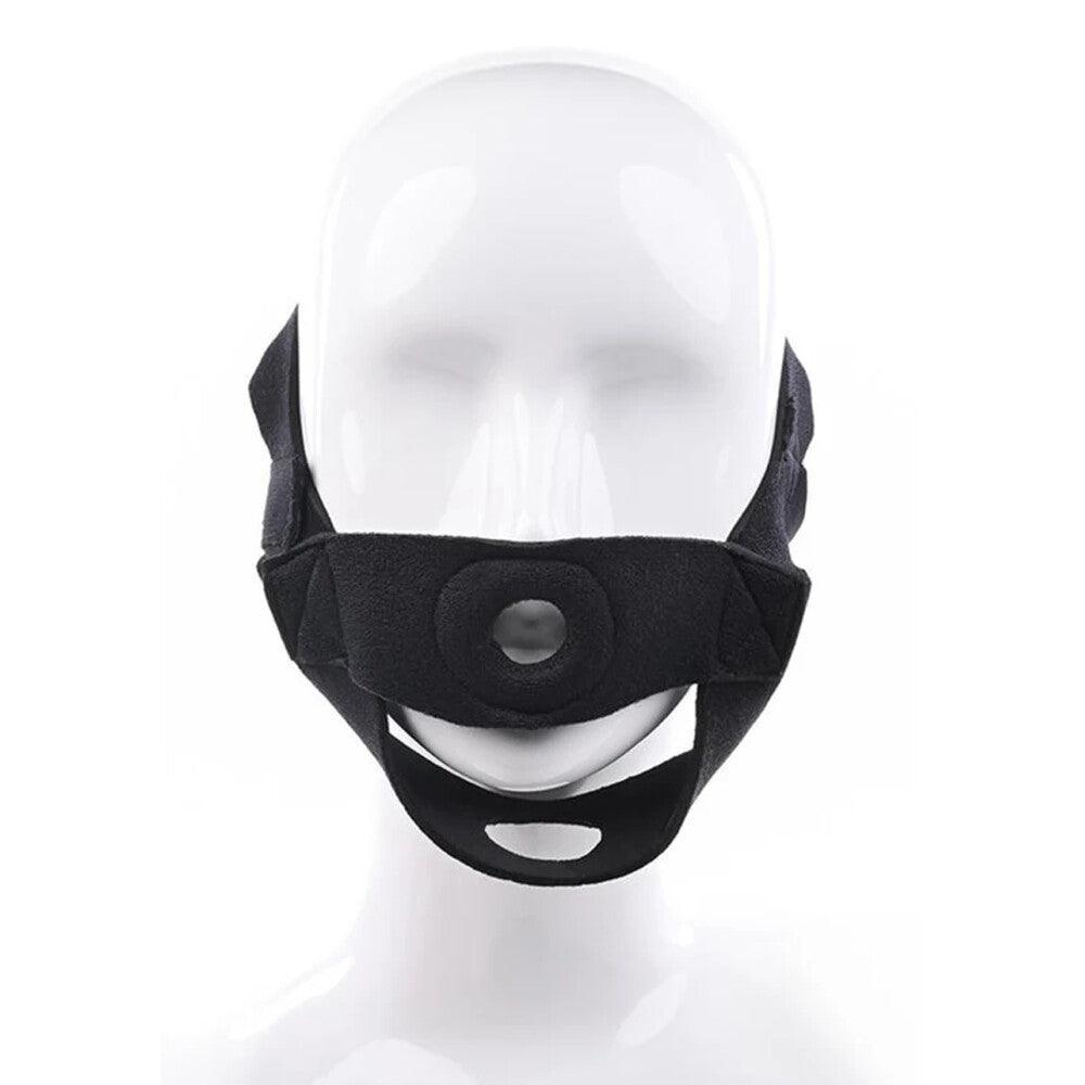 Black face strap-on harness on white mannequin